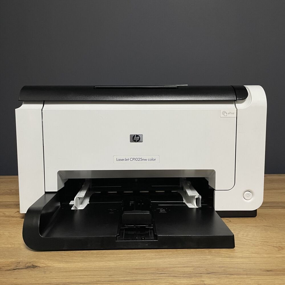 Máy in laser màu HP Color Laserjet CP1025NW - Giải pháp in ấn tiết kiệm và hiệu quả cho văn phòng vừa và nhỏ May in laser mau Hp Color Laserjet CP1025NW